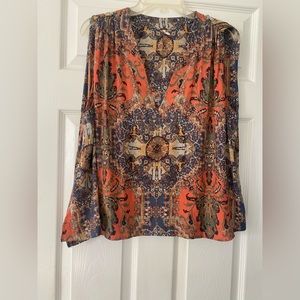 Free People sleeveless shirt. Size XS. Coral and blue print.
